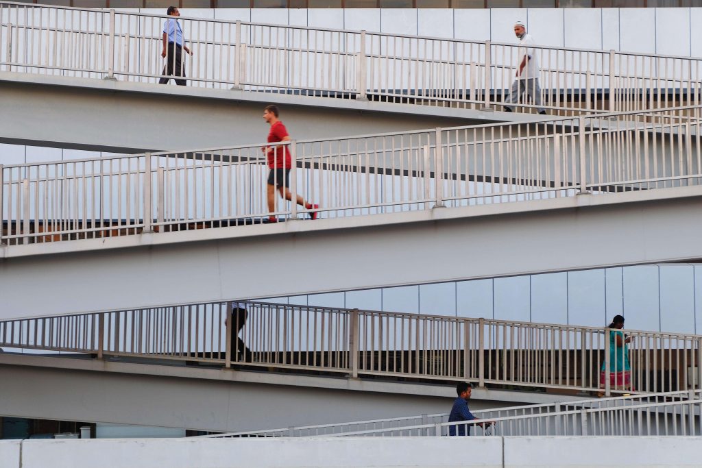 Man walking down a ramp